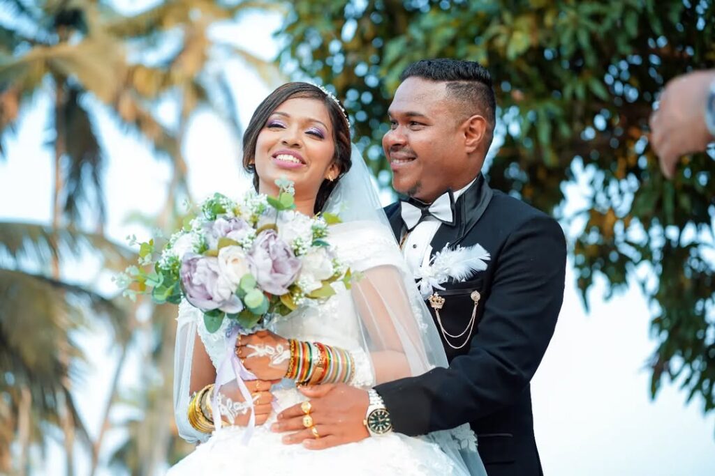 Romantic wedding couple portrait at sunset
